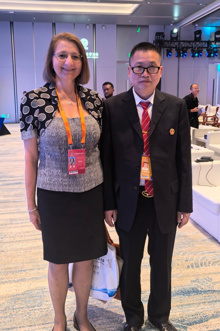 黄飞业在京会见联合国官员卢斯玛丽亚德拉莫拉